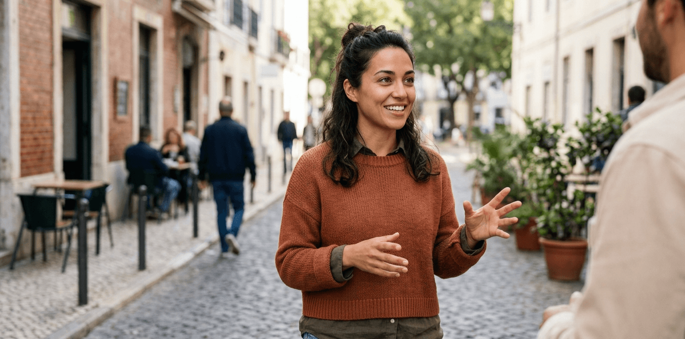 Person speaking English confidently outdoors in a casual conversation, showing natural communication